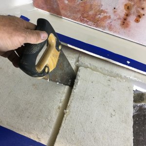 A small hand saw turned out to be the best tool for removing the styrofoam.