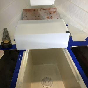 Hole cut large enough for 12 gal water tank to fit in.
