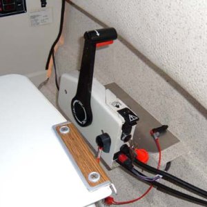 Moved throttle inboard,up and forward. Original position had it behind me when in reverse