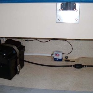 Auto Bilge pump "Basket" is glued to deck to avoid drilling holes.Battery is moved forward to make it accessable