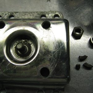 Broken spacer/bushing.