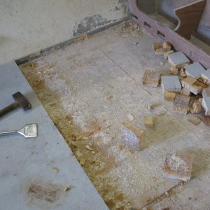 Media 'may 13, 2011 005 - Dreaded but anticipated decision to do complete replacement of main deck sole. Skin cut in apprx. 5" squares & pried out w/wide carpet chisel.  Great tool for this - they pop out readily.' in album 'c-dory 001 forlorn/forgotten in the ghetto'