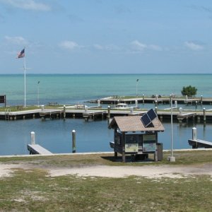 Media 'This is the marina at Flamingo.  This is the southern end of the "Wilderness Trail", a boat trek that meanders 100 miles through the Everglades.' in album 'Small Manatee joined us in the marina on Stock Island'