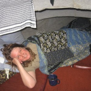 Open V-berth on the classics are easier to get in and out of and dont give the swampy closed in feeling.