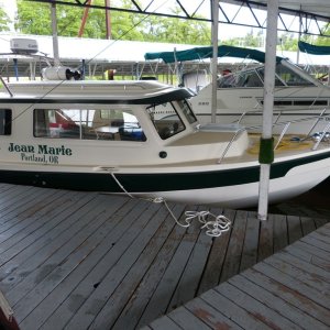 Jean Marie in her home port, Sportcraft Landing in Oregon City.  She's a documented vessel, so hailing port is a required marking. No state registration numbers and I like the clean look on the bow.