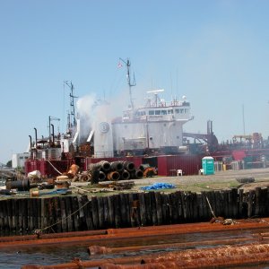 Small yard near NOAA that overhauls  dredges.