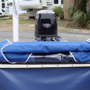 Media 'cover rolled and stored still attached
to back of lazerette' in album 'Picking up special order 16 Angler'