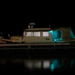 Tucked-in-at-Goosepond. The green led rope lights portray a ghostly image. We usually have this marina to ourselves at night.