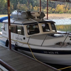 Media 'Guest Dock Mountain Harbor Marina.' in album 'Puppies got a "treat" for being good while we visited Garvan Gardens.  They love McD's soft serve.'