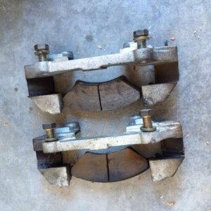 Part of disk brakes bolted to suspension