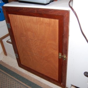Media 'Door to cover old icebox' in album 'Factory installed receptical looking astern. Maybe 1/4 clearance between seat and receptical'