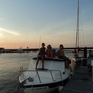 Pam & the kids watching the sun set.