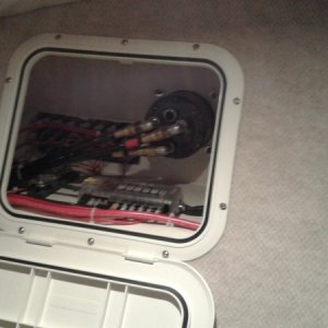 Enclosed Electrical Panel is cleaner but seem to be more difficult to access