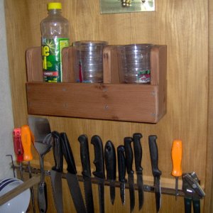 Holds glasses , cups, soap ect.