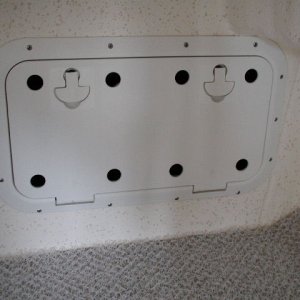 Hatch covers to forward compartments, drilled for ventilation