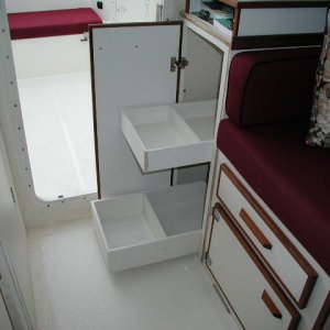 Media 'Completed with two slide outs. We may add an upper fixed shelf. Still need to reinstall Teak molding.' in album 'Spring type strut to hold doors open.'