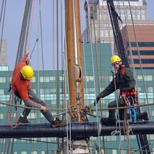 Media 'Top yard stern mast 120' off the water. Chad on the left I am on the right still drinking bean juice.' in album '(Tony) My girls'