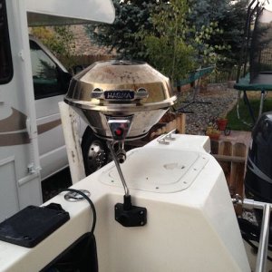 Scotty mount doubles as BBQ holder.