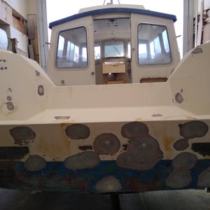 All fasteners removed and all holes epoxy filled.