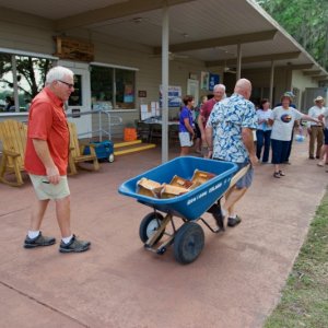 'Tote that...wheel barrow full of chicken.  Tom--always the leader and laborer.