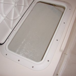 Media 'Painted with West Marine Starbrite and bedded the hatch with 4200.I figure the hatches will hold air as floatation for a while.' in album 'Apx 2 cu ft of foam per side'
