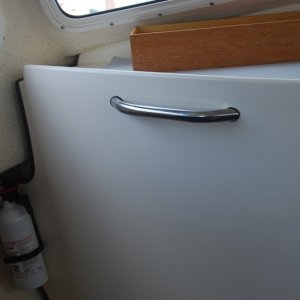Media '12" SS Hand Hold added for Mate.
Mounting is with 1/4" -20 x 2" welded studs with SS 1" flat washers as 'back plates' and nylon nuts.' in album 'The 10" Grab Rails added to the inside of Sea Angel's head as 'throne lifters'. Rails were purchased from the factory stock.'