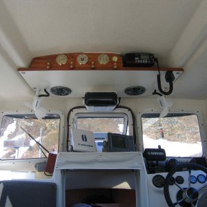 New Work 2007 - Installed Stereo + Speakers, 2 12 V fans (work wonders for condensation), Built Weather Station (barometer, thermometer, hygrometer and clock)Wood is African Mahogany