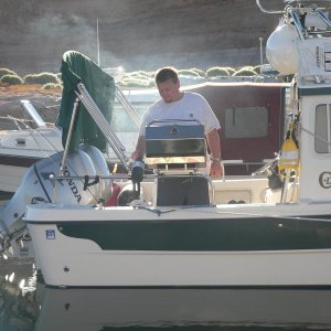 Robert preparing a gourmet meal after a long journey on the Colorado River at Oak Canyon