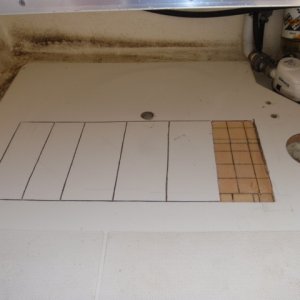 Media 'Hole for deck plate to the right.  Factory hole to insert foam under the cockpit floor on top.  The area of the cockpit floor that I opened up hoping to dry out the core, in the center.' in album 'Deckplate under porta potti'