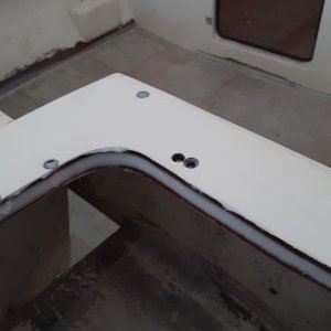 Media 'thickened epoxy put in' in album 'used the aluminum tool I made in the drill to remove the core'