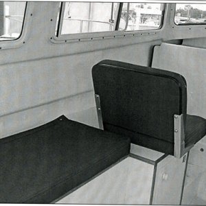 BEFOFE: Original port bench seat with copilot chair for CD 22 Commuter version. Starboard side was identical. This side now has been modified to form a bed and houses a 20 gallon water tank.