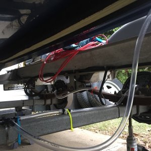 Media 'Fresh water rinse hosing under trailer' in album 'Electric Brake after 5 seasons, still going strong.'