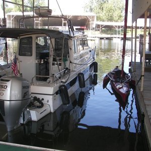 Media 'Actually fits in the slip when folded!!! 'Has retractable, pivoting dagger board, and flip-up rudder.' in album 'All folded up, resting.'