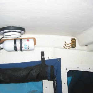 Media 'Brass coat hanger.  a nice addition that folds out of the way when not needed.' in album 'Teak log and cup holder'