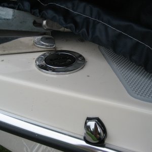 Media 'Porta-Potty pump out cap and vent, located on port side of bow' in album 'Teak log and cup holder'