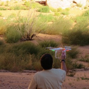 Media 'Jody grabbing his helicopter as it comes back down in Forgotten Canyon Monday afternoon 9-23-13' in album 'Somewhere between Halls Crossing and the Rincon Thursday 9-19-13'