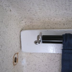 Media 'Here is the end of the curtain rail, a screw eye into the wood followed by a screw and finishing washer screwed into the end of the curtain rods works like dream. How did a screw it it? Held the screw with plyers and rotated the curtain rail. Took me a while to figure that one out!' in album 'Curtains on the cheap'
