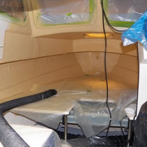 I used my shop vac to blow warm air in.  I left it on over night because I had sprayed so much material (about 3 gallons).