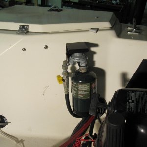 Propane supply, regulator, shut-off mounted in starboard splashwell