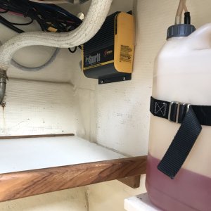 Battery charger below stove