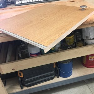 Laminating the edges of all the doors and cabinets.