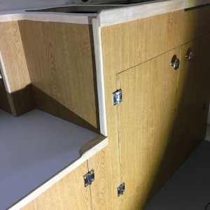 Fabricating and putting oak trim on.