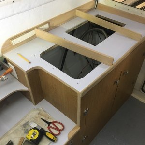 Backsplash glued in place.