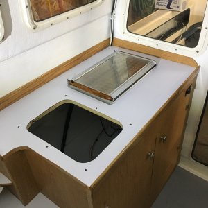Wallis stove installed. Had it overhauled in Seattle over the winter at Scan Marine.