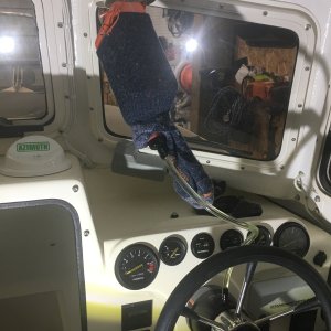 Filling the new helm pump with fluid hung in a sock as I bleed the system.