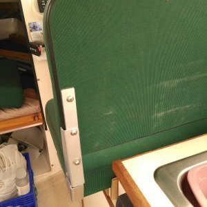 Raised seat back with two pieces of flat aluminum - much more comfortable