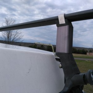 Yakima tower with wrench in place to tighten cross bar and tower to gutter clamp
