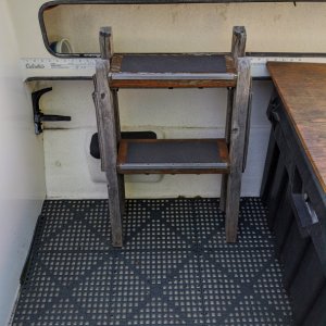 Boarding ladder & fire extinguisher mount