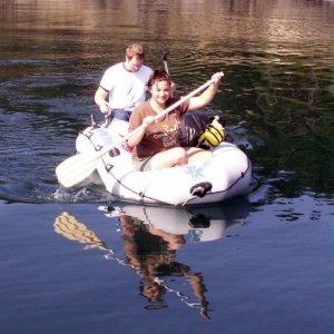 Conor, Lydia and Baxter in Dinghy at Clark  Island 8-13-06