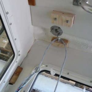 Media '3c. Behind Cabin Liner Port Side (7)' in album 'Cabin Interior fully lined with marine foam insulation and covered with marine vinyl.
All Storage lockers on board are also lined with 1/2" sheet foam insulation. 
I have no condensation collecting on the cabin liner or in the storage lockers. No need for fans on the forward windows.
The sheet foam in the storage lockers also gives cushion to all stowed articles and the boat is very quiet while running.'